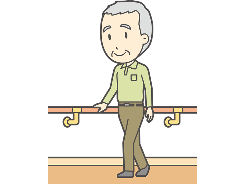 手すりを使って歩く高齢者